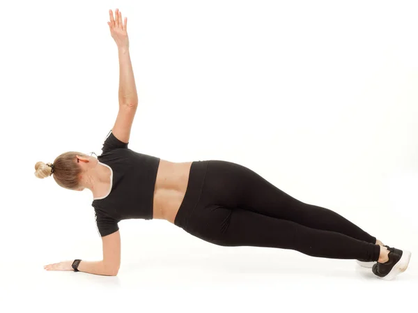 Girl doing fitness on a white background. — Stock Photo, Image