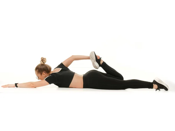 Girl doing fitness on a white background. — Stock Photo, Image