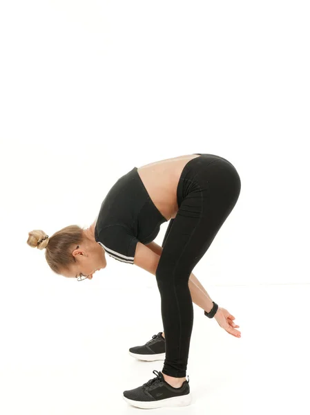 Girl doing fitness on a white background. — Stock Photo, Image