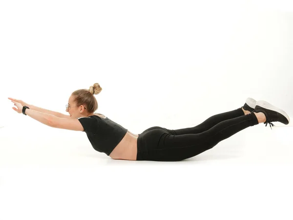 Girl doing fitness on a white background. — Stock Photo, Image