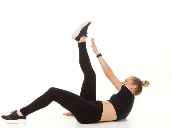 Girl doing fitness on a white background. — Stock Photo, Image