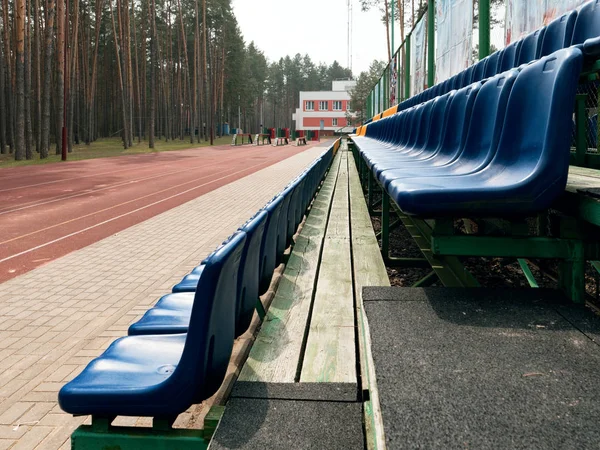 Small sport stadium with stands for fans — Stock Photo, Image