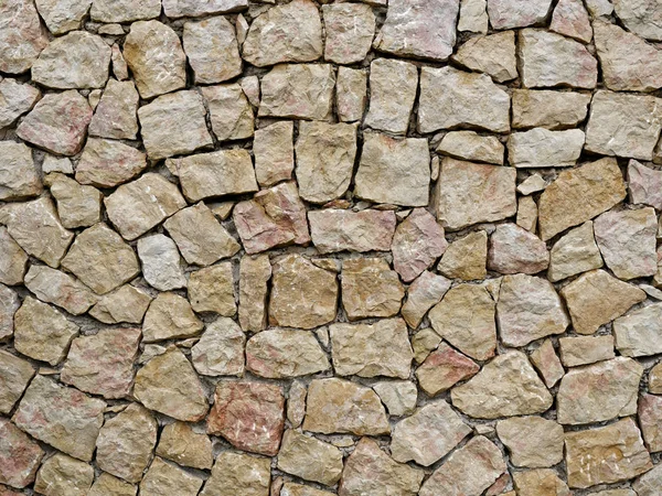 beautiful wall made of natural yellow stone