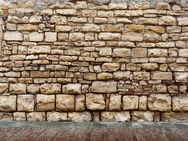 İtalya'nın eski kentinde sarı taş duvar — Stok fotoğraf