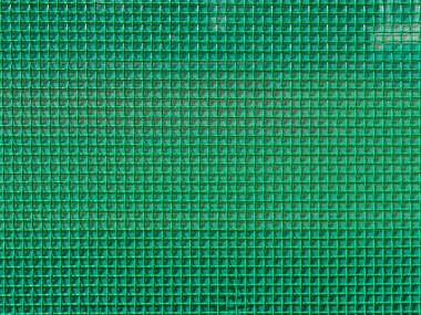 yeşil polimer ile kaplanmış dekoratif metal örgüden yapılmış duvar. Arka plan