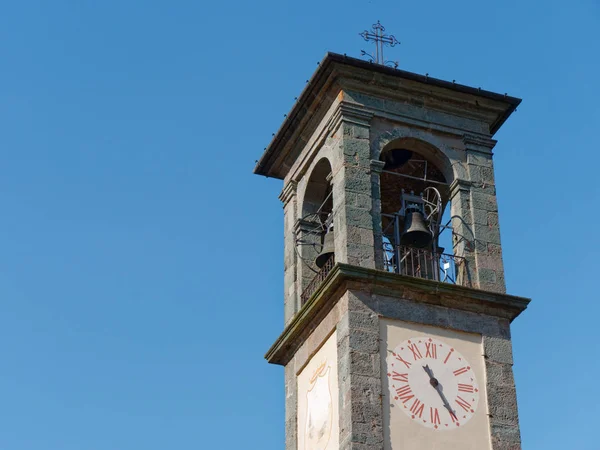 Bell tower of a mountain italian village — Stock Photo, Image