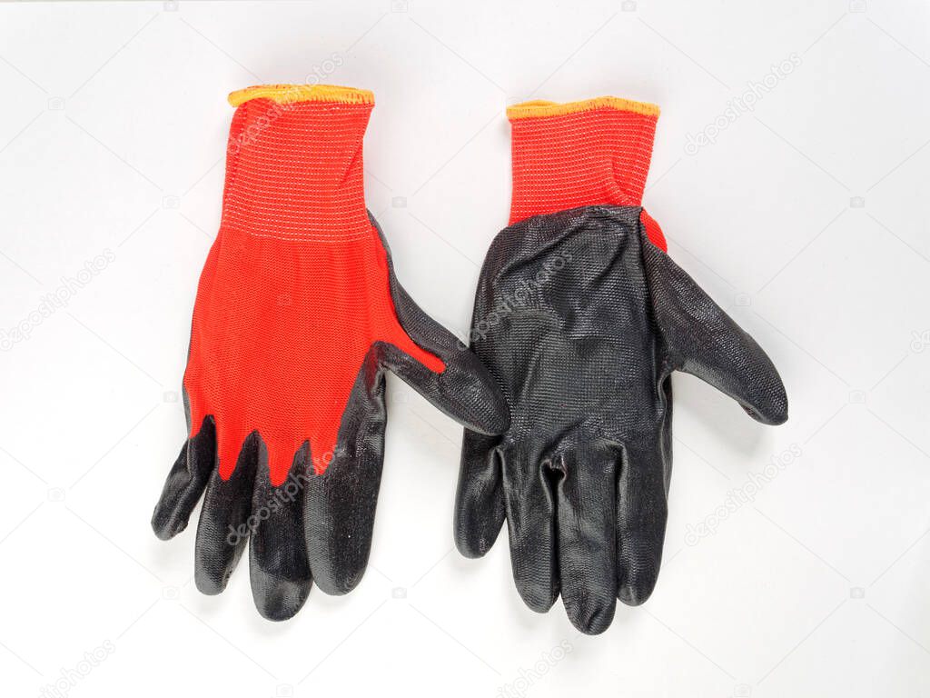 gloves in an assortment of construction gloves for a garden and a vegetable garden on a white background 2020