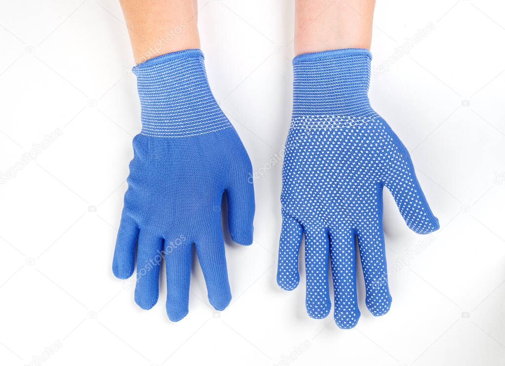 gloves in an assortment of construction gloves for a garden and a vegetable garden on a white background 2020