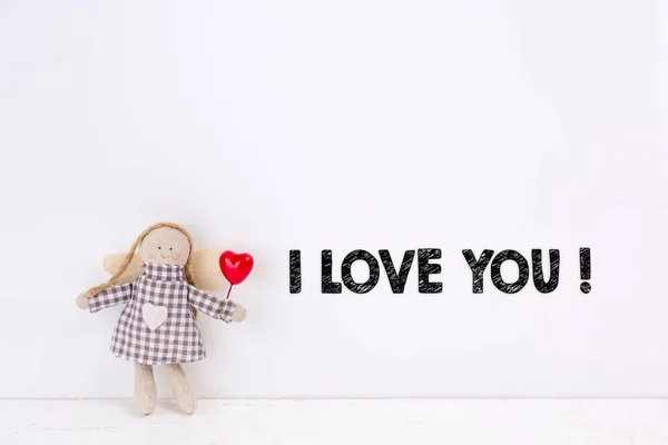 Little angel doll with heart and I love you text