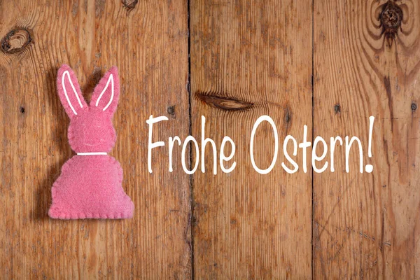 Ροζ Πασχαλινό Κουνέλι Κείμενο Frohe Ostern Ξύλινο Φόντο Μετάφραση Καλό — Φωτογραφία Αρχείου