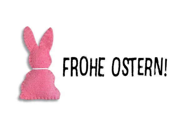 Beyaz tahtada 'Frohe Ostern' yazılı Pembe Paskalya Tavşanı. Çevirisi: Mutlu Paskalyalar