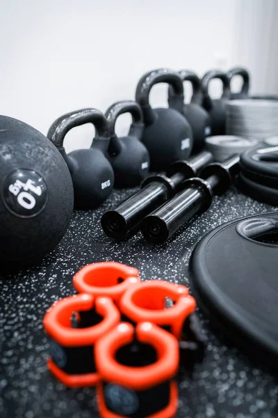 Gym equipment with kettle bells weights and a ball. High quality photo