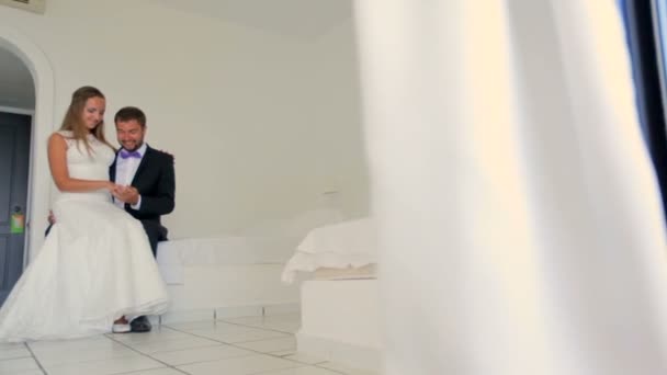 Happy newlyweds in their hotel . — Stock Video