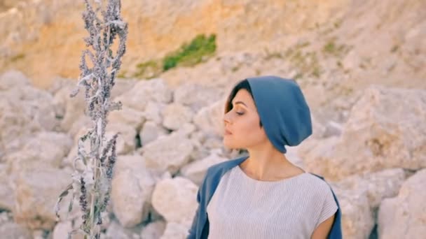 Young Beautiful Woman Stands Background Mountains Stones Magic Grass Casts — Stock Video