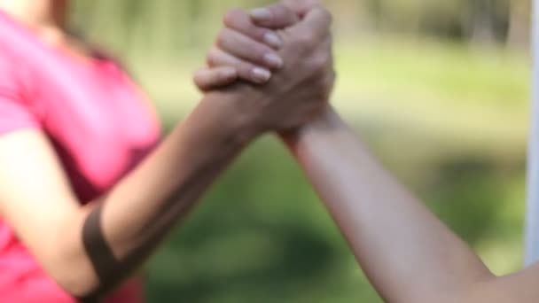 Two twin girls in the forest in sportswear. Surrealistic scene with a mirror image. Fairyland of Wonderland — Stock Video