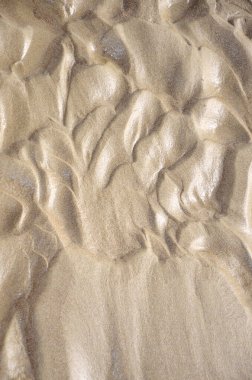 Islak ince kumun soyut arkaplanı 