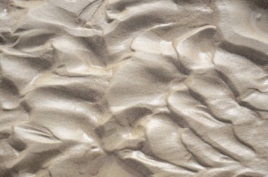 Islak ince kumun soyut arkaplanı 