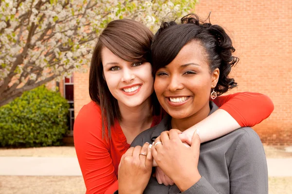 Diverse group of friends talking and laughing. — Stock Photo, Image