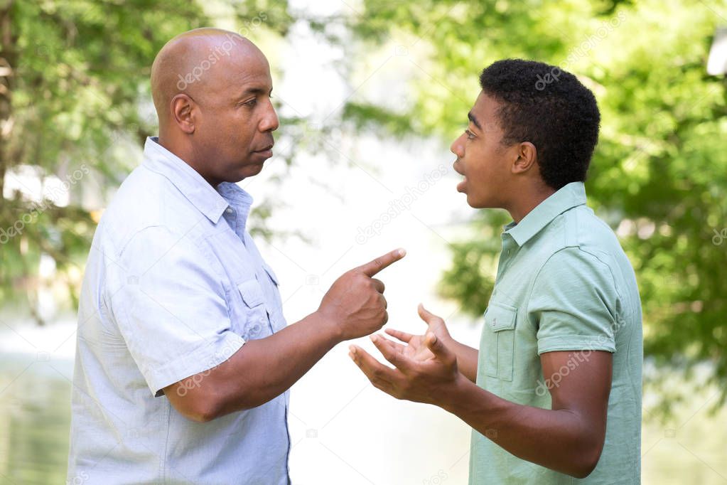 Father and son having a serious conversation.