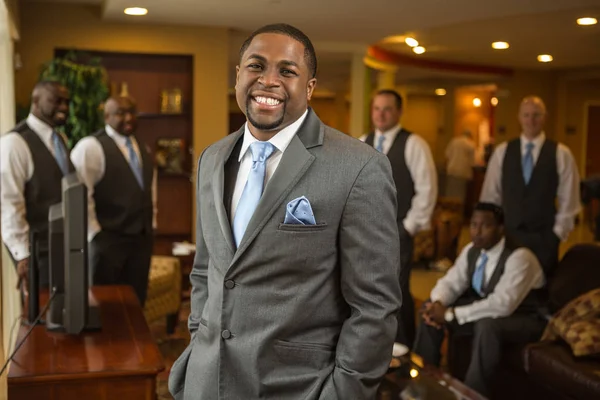 African American groom and groomsmen smiling. — Stock Photo, Image