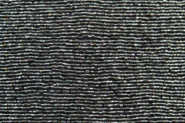Black textured background that sparkles. — Stock Photo, Image