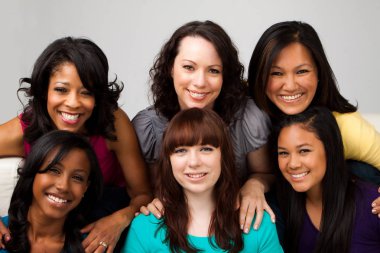 Diverse group of mothers and daughters. clipart