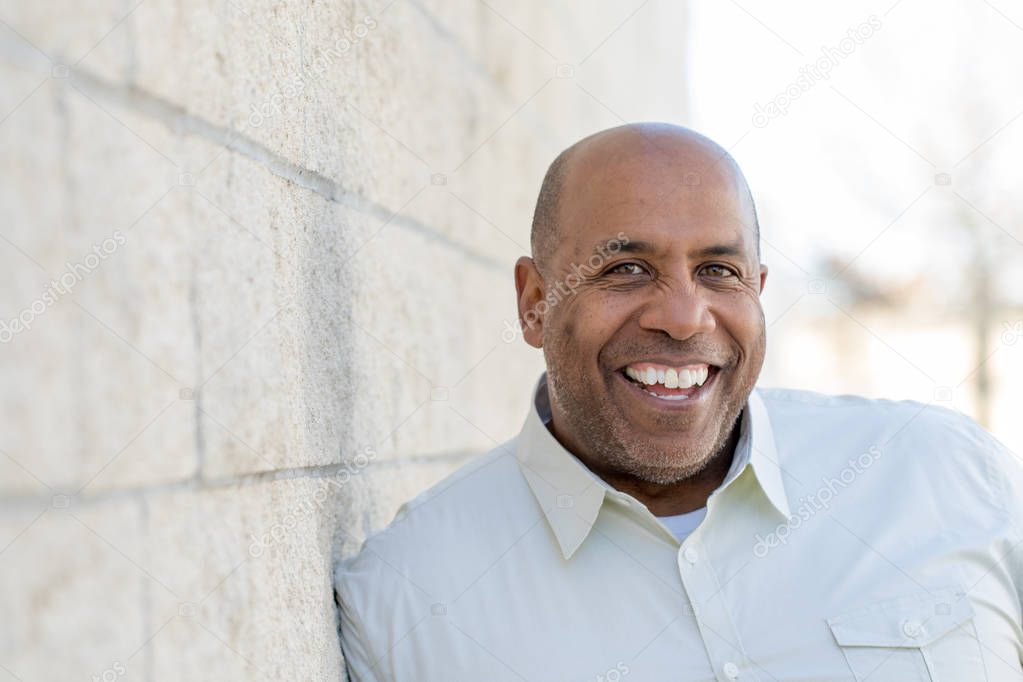 African American man smiling.