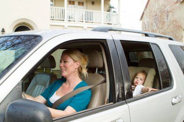 Mother taking a road trip with her daughter. clipart