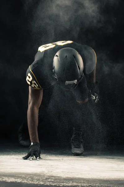 African American football player isolated on black. — Stock Photo, Image