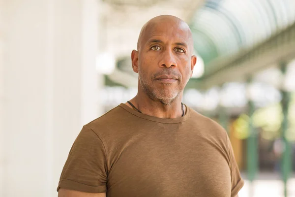 Mature African American man smiling wearing glasses. — Stock Photo, Image