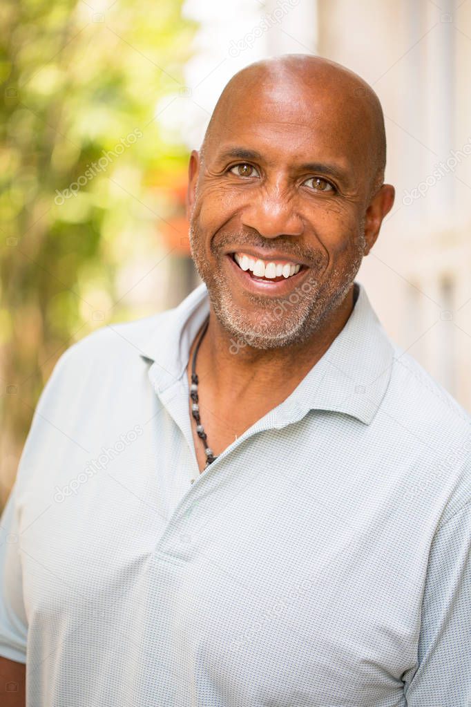 Portrait of a happy mature African American man smiling.