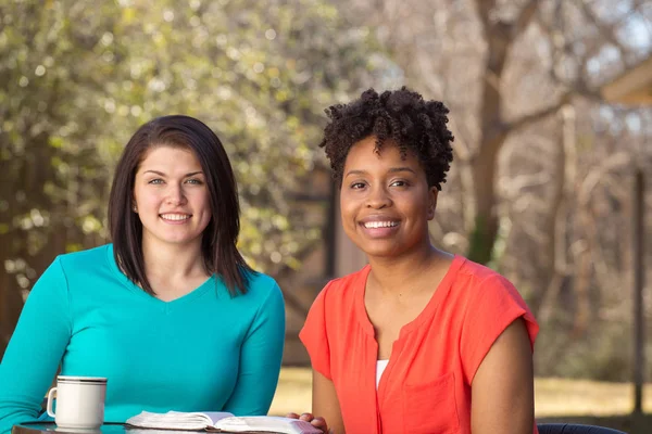 Portrait of friends reading, praying and learning together. — Stock Photo, Image