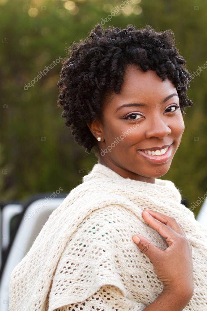 Portrait of an African American woman smiling.