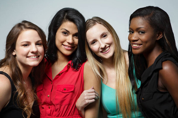 Happy and smiling multicultural woman isolated on white.