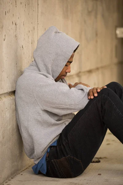 Portarit of a African American young teen feeling depressed. — Stock Photo, Image