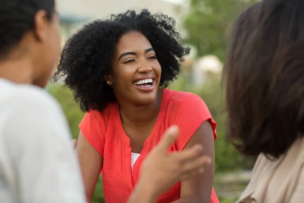 Diverse group of friends talking and laughing. — Stock Photo, Image