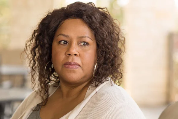 African American middle age woman looking sad. — Stock Photo, Image