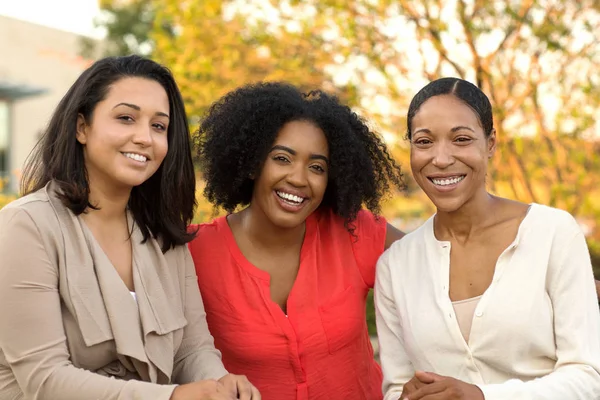 Diverse group of friends talking and laughing. — Stock Photo, Image