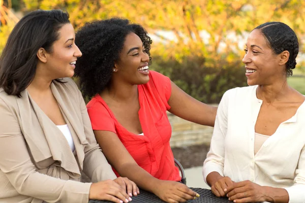 Diverse group of friends talking and laughing. — Stock Photo, Image