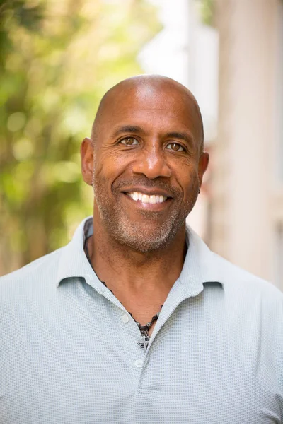 Portrait of a happy mature African American man smiling. — Stock Photo, Image