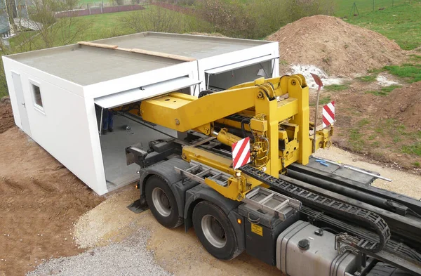 Delivery of a prefabricated garage on construction side