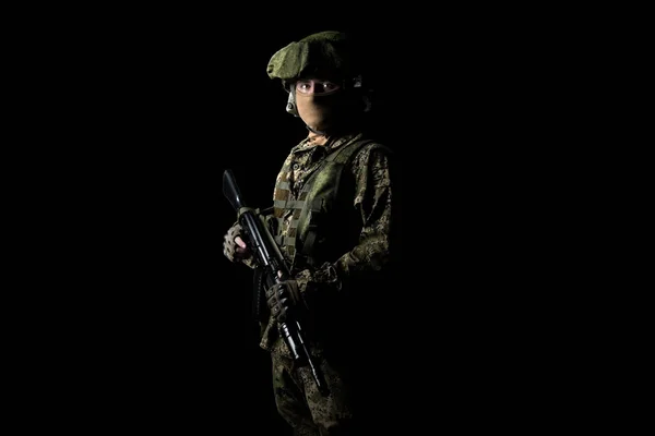 Male in mechanized infantry uniform. Shot in studio. Isolated with clipping path on black background