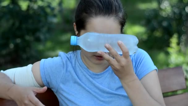 Girl Cooled Using Bottle Ice Water Stock Video C Kivitimof