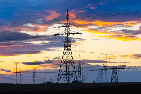 Elettricità Energia Elettrica Industria Pali Elettrici Tramonto Con Cielo Colorato — Foto Stock