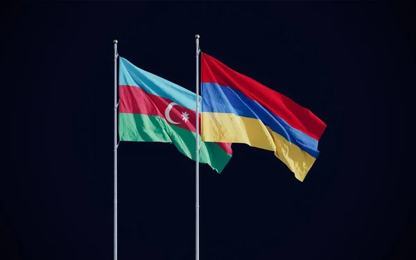 Ermenistan ve Azerbaycan bayrakları, Nagorno-Karabağ 'daki çatışma ve savaşı simgeleyen karanlık arka plana karşı dalgalanıyor