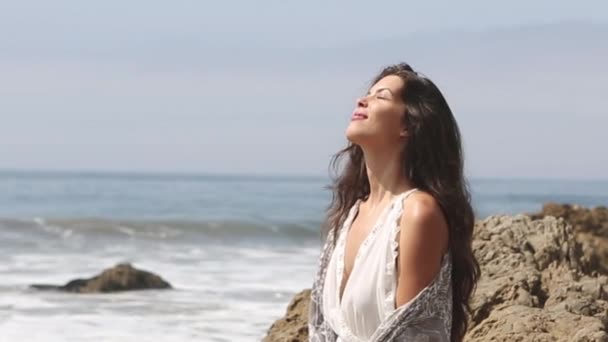 Young woman happy at the beach. summer feeling — Stock Video