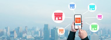 Akıllı telefon ve dükkan ikonunda uygulama kullanan gençlerle çevrimiçi alışveriş. Rahat bir hayat. Teknoloji ve yeni normal rutin.