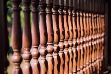 Close up row of wooden balustrade clipart
