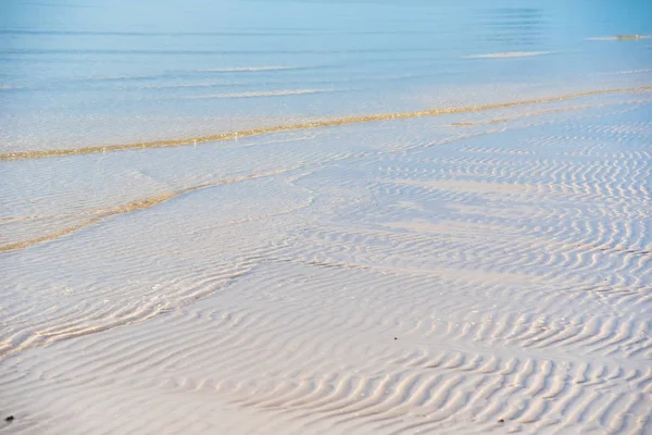 Beautiful white sand beach, clear wave water, white sand and sea nature sunshine time.Thailand