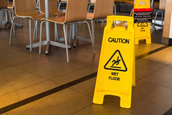 Yellow Sign Alerts Wet Floor Restaurant Thailand — Stock Photo, Image